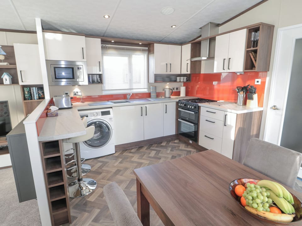 Fridge, electric kettle, toaster, cookware/dishes/utensils