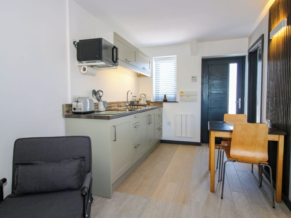 Fridge, electric kettle, toaster, cookware/dishes/utensils