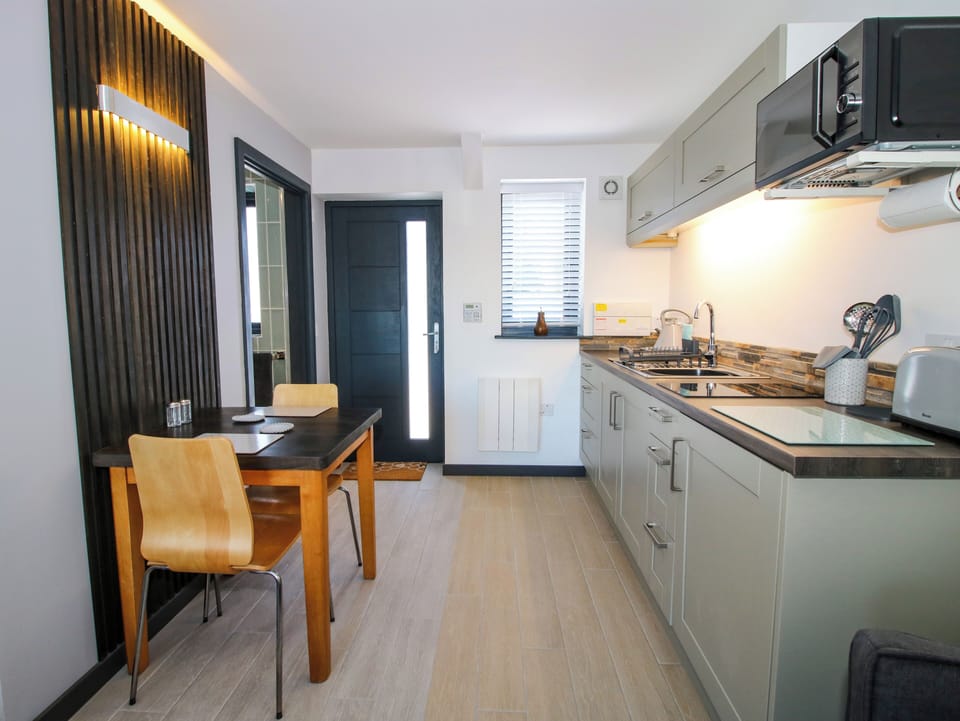 Fridge, electric kettle, toaster, cookware/dishes/utensils