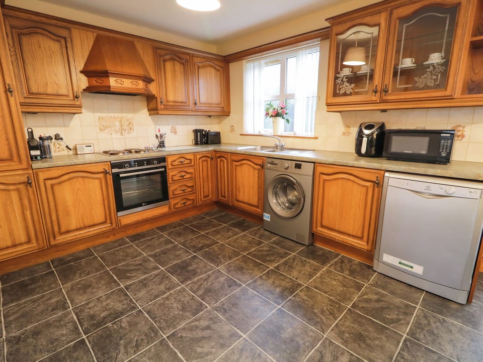 Fridge, electric kettle, toaster, cookware/dishes/utensils
