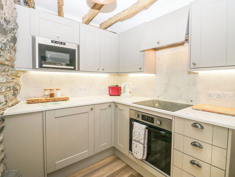 Fridge, electric kettle, cookware/dishes/utensils