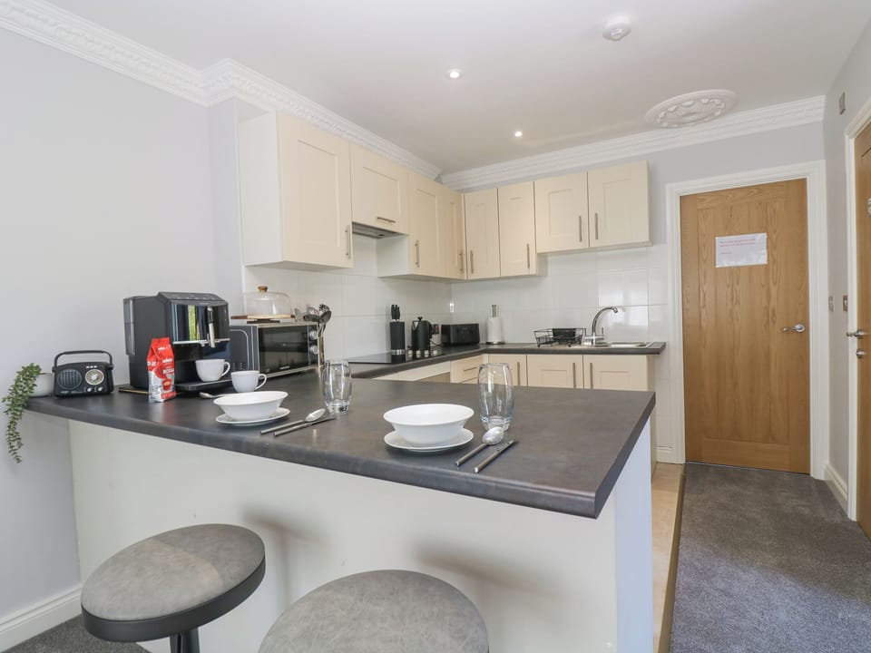 Fridge, electric kettle, toaster, cookware/dishes/utensils