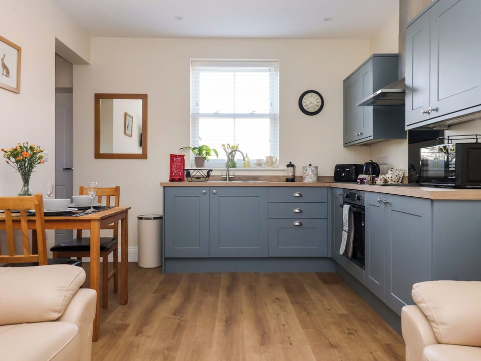 Fridge, electric kettle, toaster, cookware/dishes/utensils