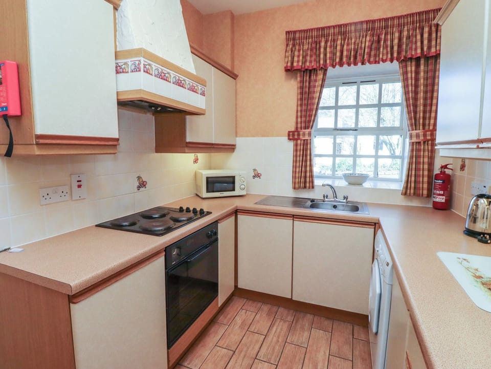 Fridge, microwave, toaster, cookware/dishes/utensils