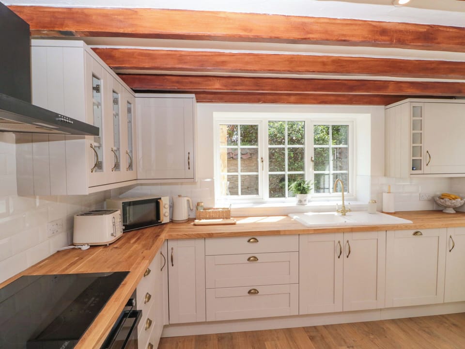Cottage | Private kitchen | Fridge, dishwasher, electric kettle, toaster