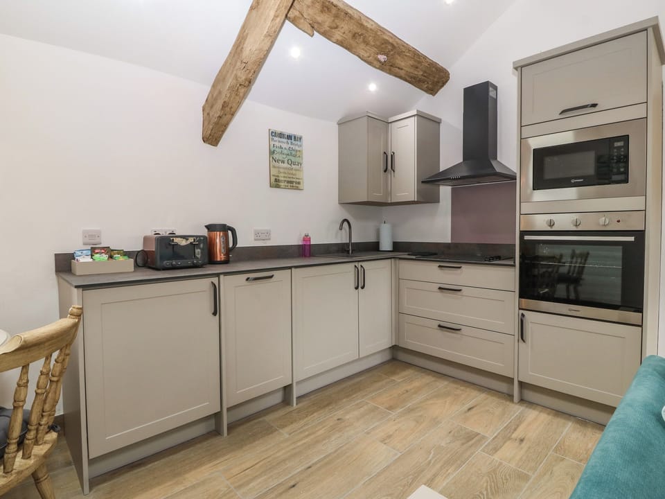 Fridge, dishwasher, electric kettle, cookware/dishes/utensils