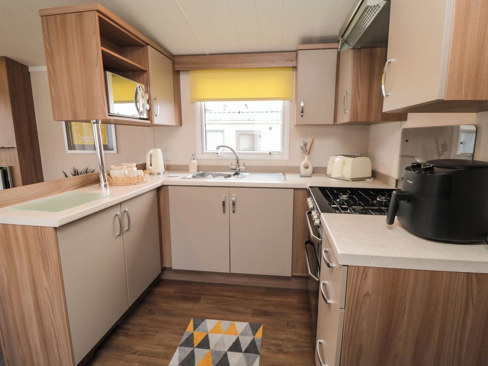 Fridge, electric kettle, toaster, cookware/dishes/utensils