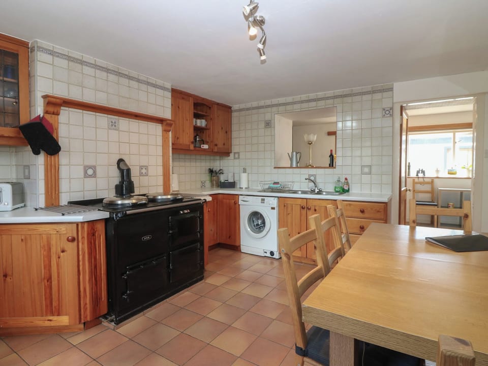 Fridge, electric kettle, toaster, cookware/dishes/utensils