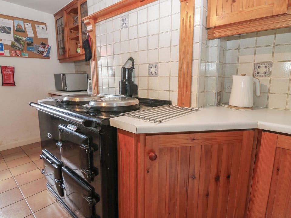 Fridge, electric kettle, toaster, cookware/dishes/utensils