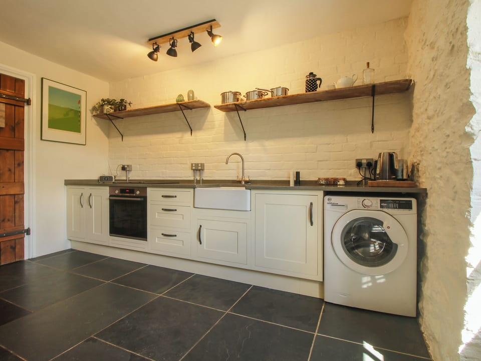 Fridge, electric kettle, toaster, cookware/dishes/utensils