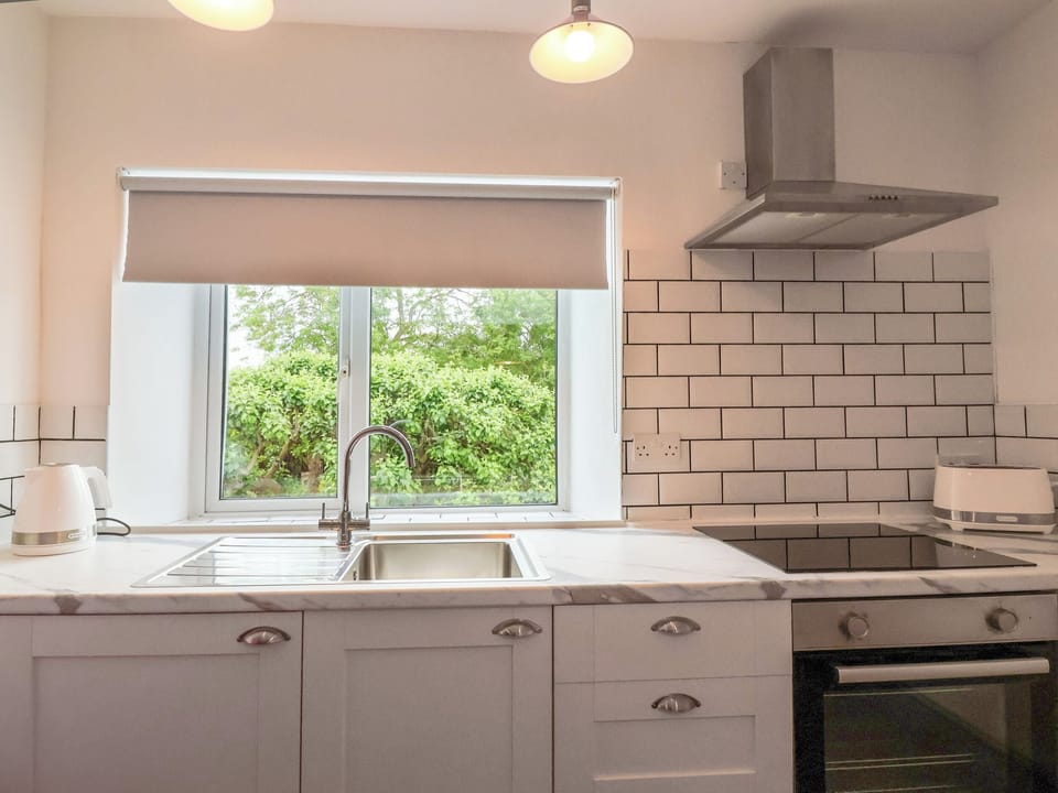 Fridge, electric kettle, toaster, cookware/dishes/utensils