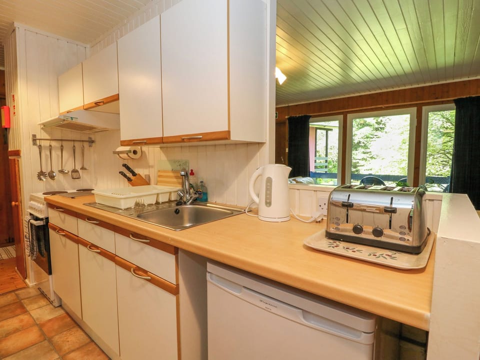 Fridge, electric kettle, toaster, cookware/dishes/utensils