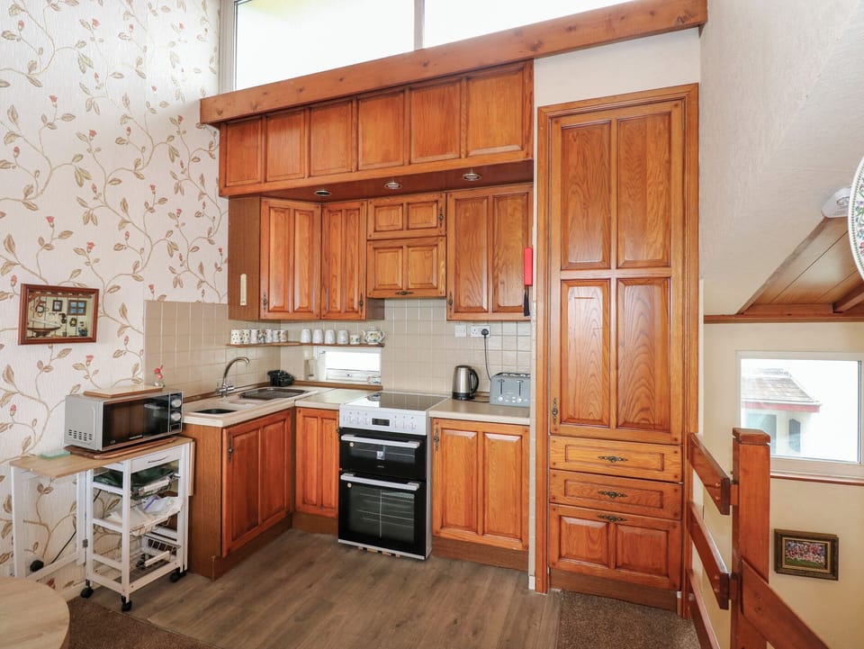 Fridge, electric kettle, toaster, cookware/dishes/utensils