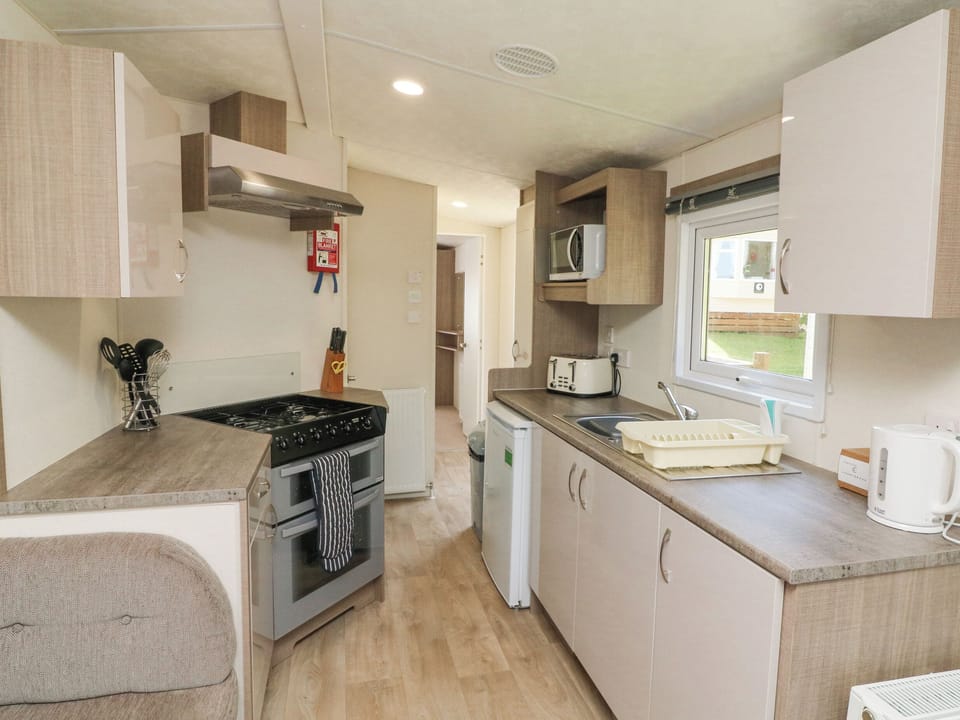 Fridge, electric kettle, toaster, cookware/dishes/utensils