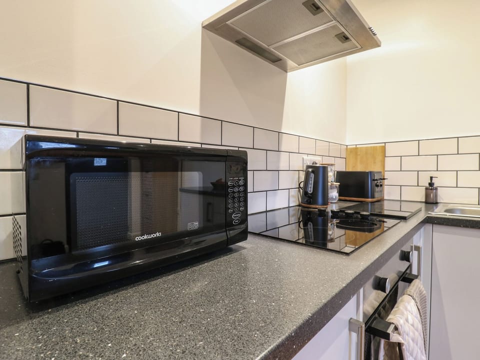 Fridge, electric kettle, toaster, cookware/dishes/utensils