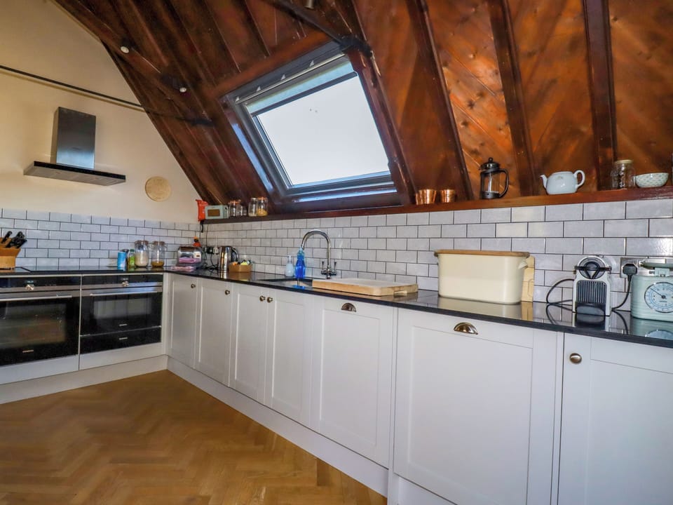 Fridge, electric kettle, toaster, cookware/dishes/utensils