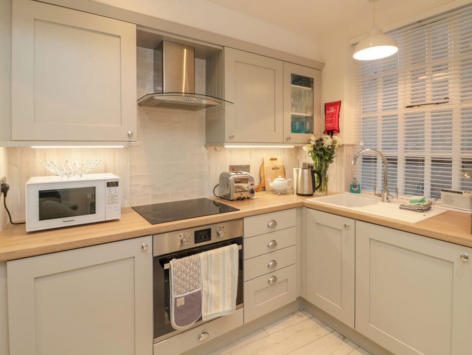 Fridge, electric kettle, toaster, cookware/dishes/utensils