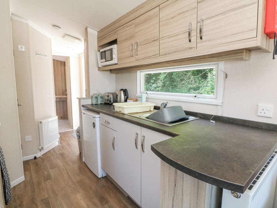 Fridge, electric kettle, toaster, cookware/dishes/utensils