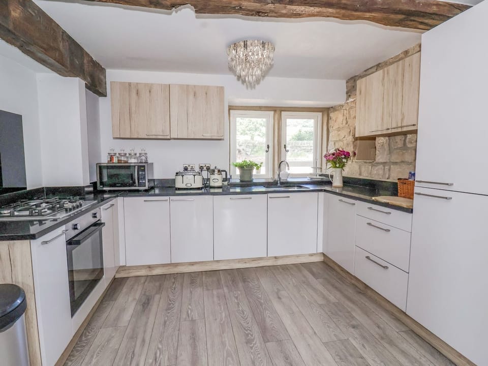 Fridge, dishwasher, electric kettle, cookware/dishes/utensils