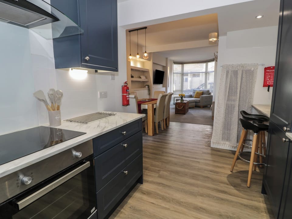 Fridge, dishwasher, toaster, cookware/dishes/utensils