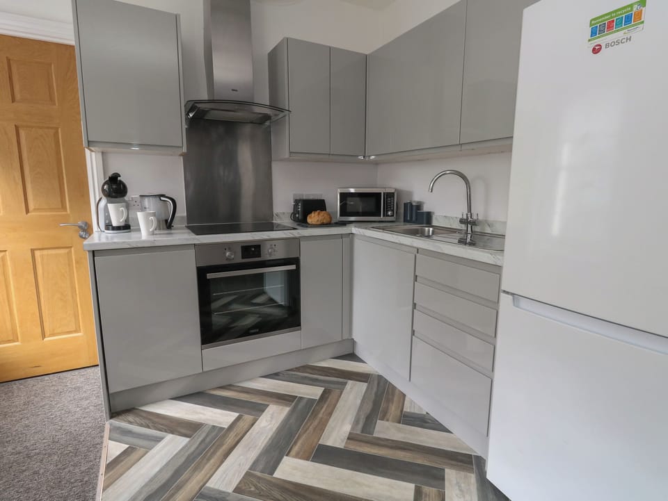Fridge, dishwasher, electric kettle, toaster