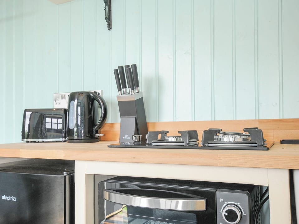 Fridge, toaster, cookware/dishes/utensils