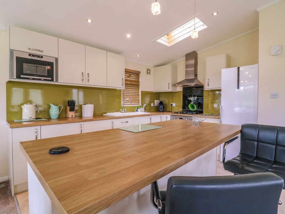 Fridge, dishwasher, electric kettle, cookware/dishes/utensils