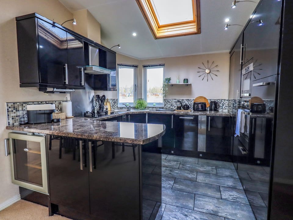 Fridge, dishwasher, electric kettle, cookware/dishes/utensils