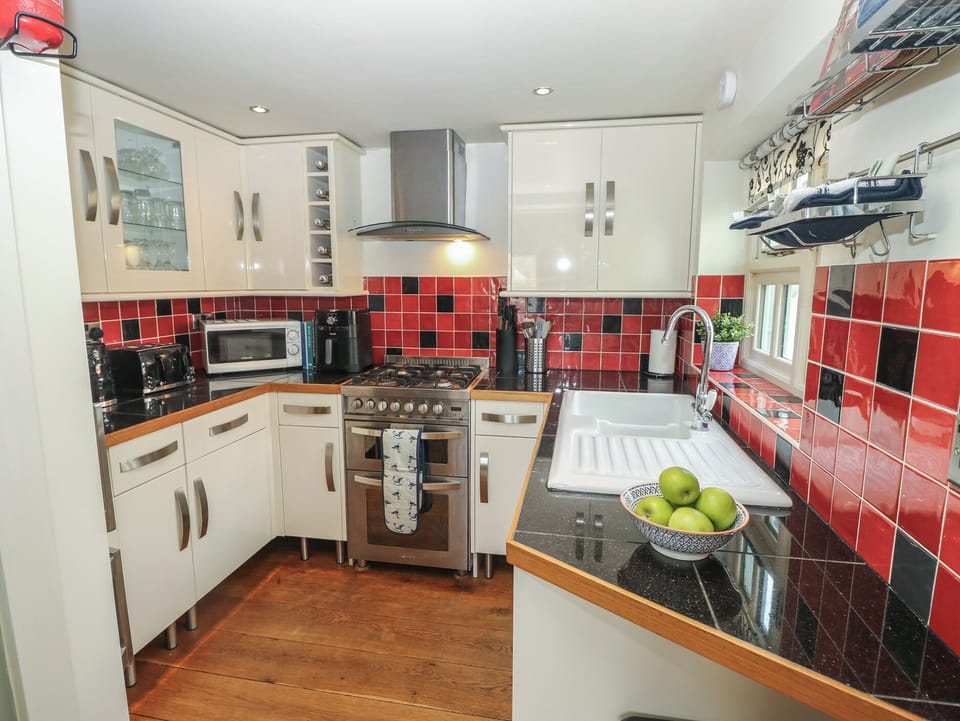 Fridge, dishwasher, toaster, cookware/dishes/utensils