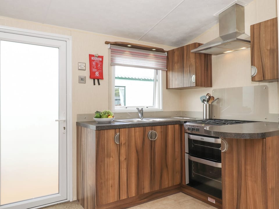 Fridge, electric kettle, toaster, cookware/dishes/utensils