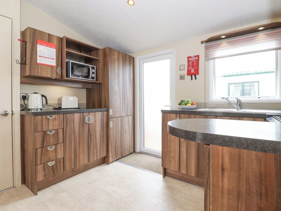 Fridge, electric kettle, toaster, cookware/dishes/utensils