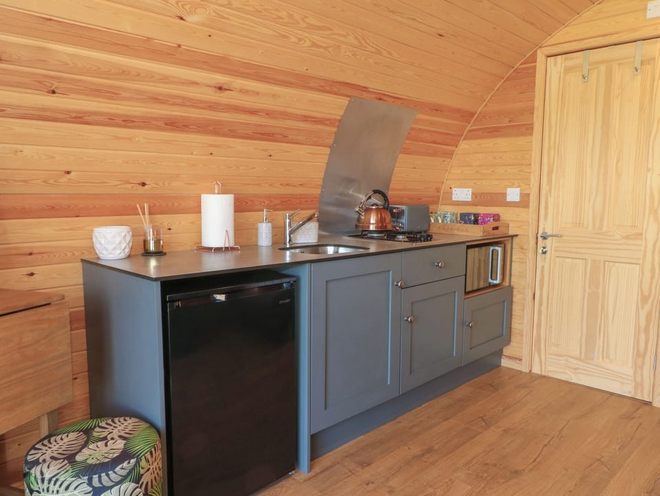 Fridge, electric kettle, toaster, cookware/dishes/utensils