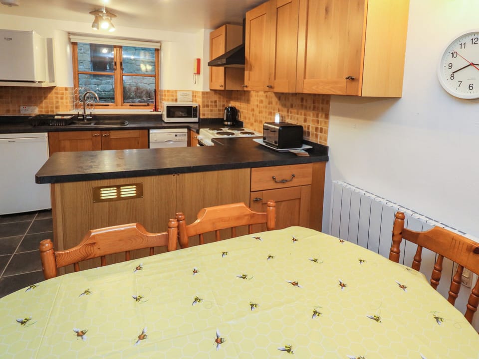 Fridge, electric kettle, toaster, cookware/dishes/utensils