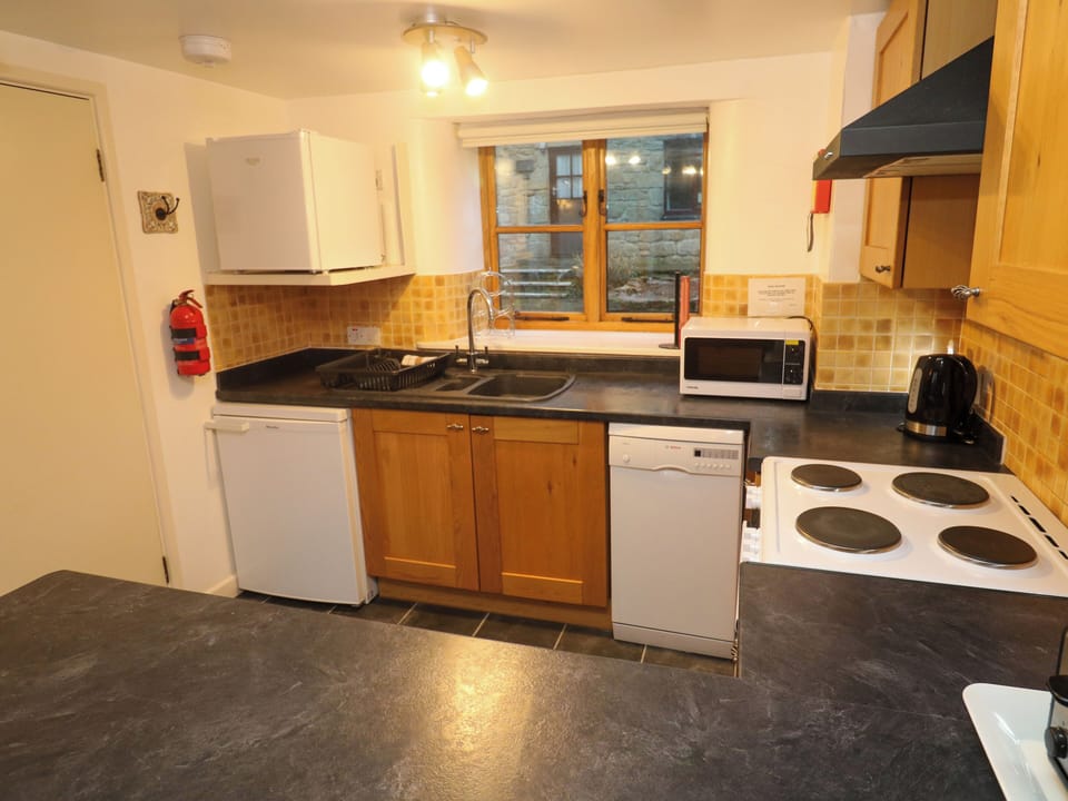 Fridge, electric kettle, toaster, cookware/dishes/utensils