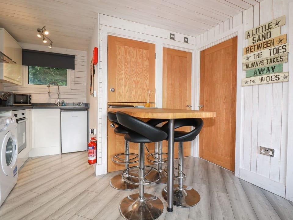 Fridge, electric kettle, toaster, cookware/dishes/utensils