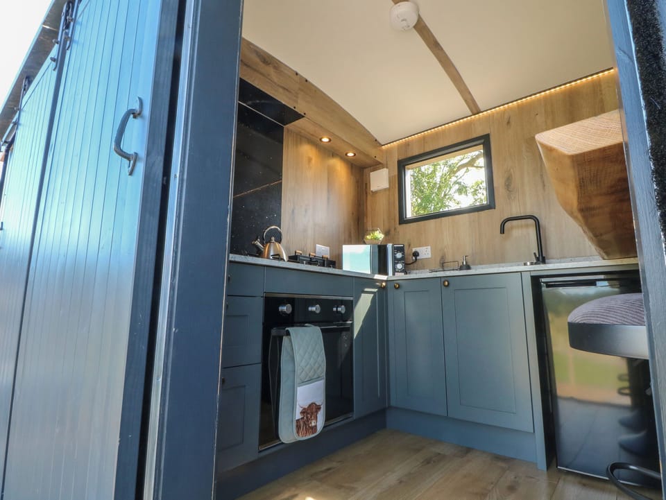 Fridge, electric kettle, cookware/dishes/utensils