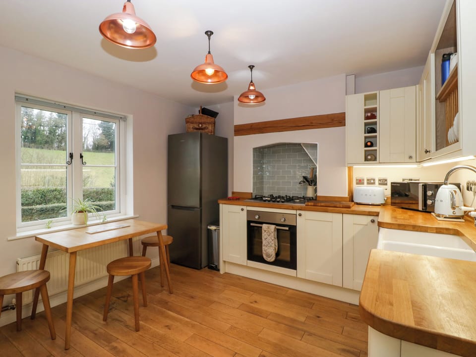 Fridge, electric kettle, toaster, cookware/dishes/utensils
