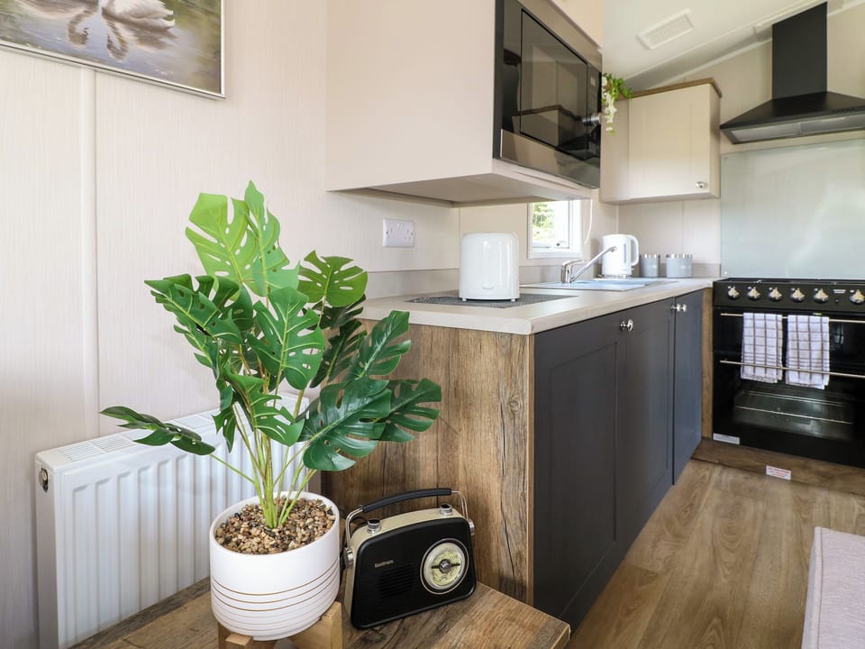 Fridge, electric kettle, toaster, cookware/dishes/utensils