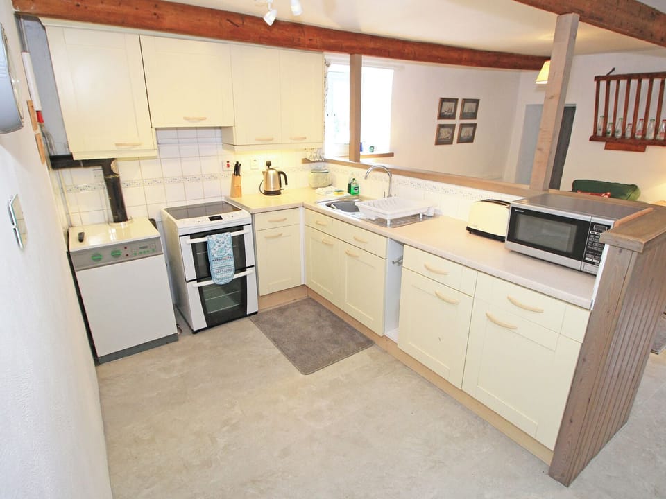Fridge, electric kettle, toaster, cookware/dishes/utensils