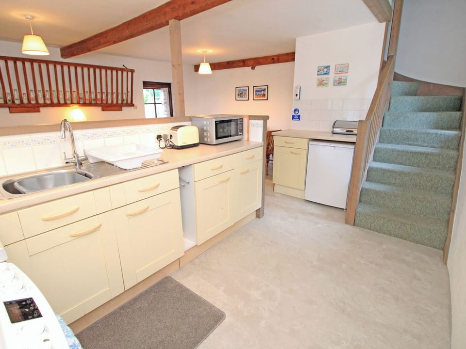 Fridge, electric kettle, toaster, cookware/dishes/utensils