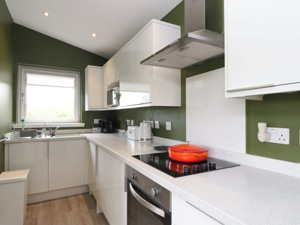 Fridge, electric kettle, toaster, cookware/dishes/utensils