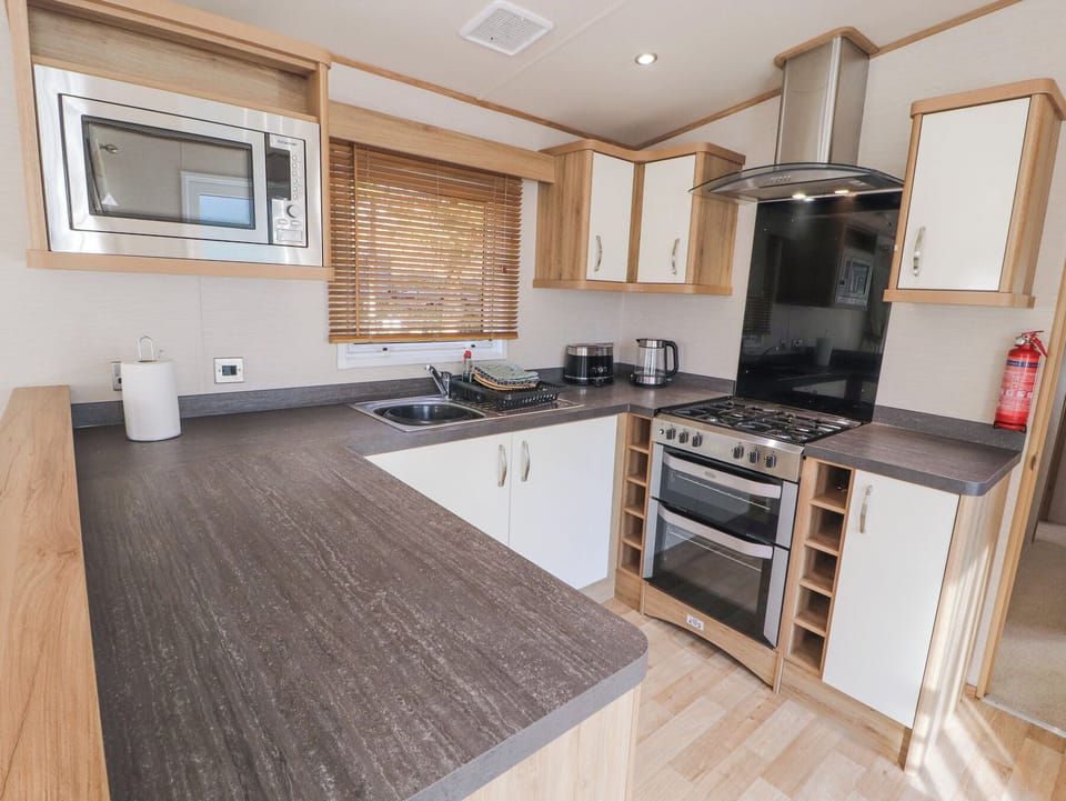 Fridge, microwave, toaster, cookware/dishes/utensils
