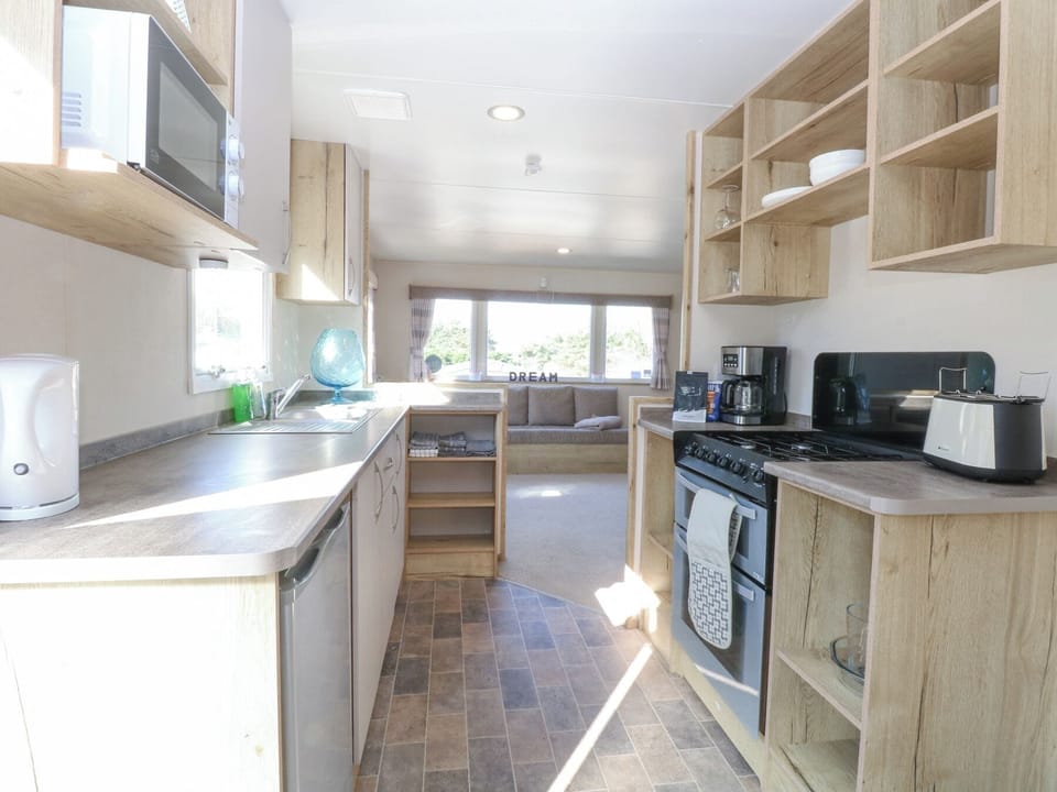 Microwave, dishwasher, toaster, cookware/dishes/utensils