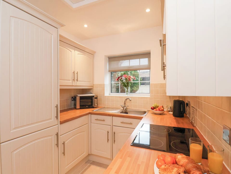 Fridge, microwave, cookware/dishes/utensils