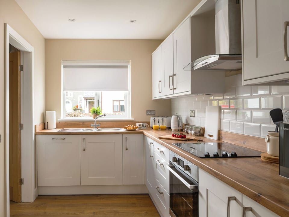 Fridge, microwave, dishwasher, cookware/dishes/utensils