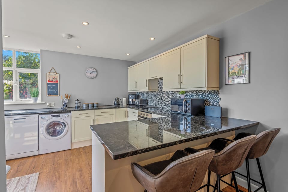 Fridge, dishwasher, electric kettle, toaster