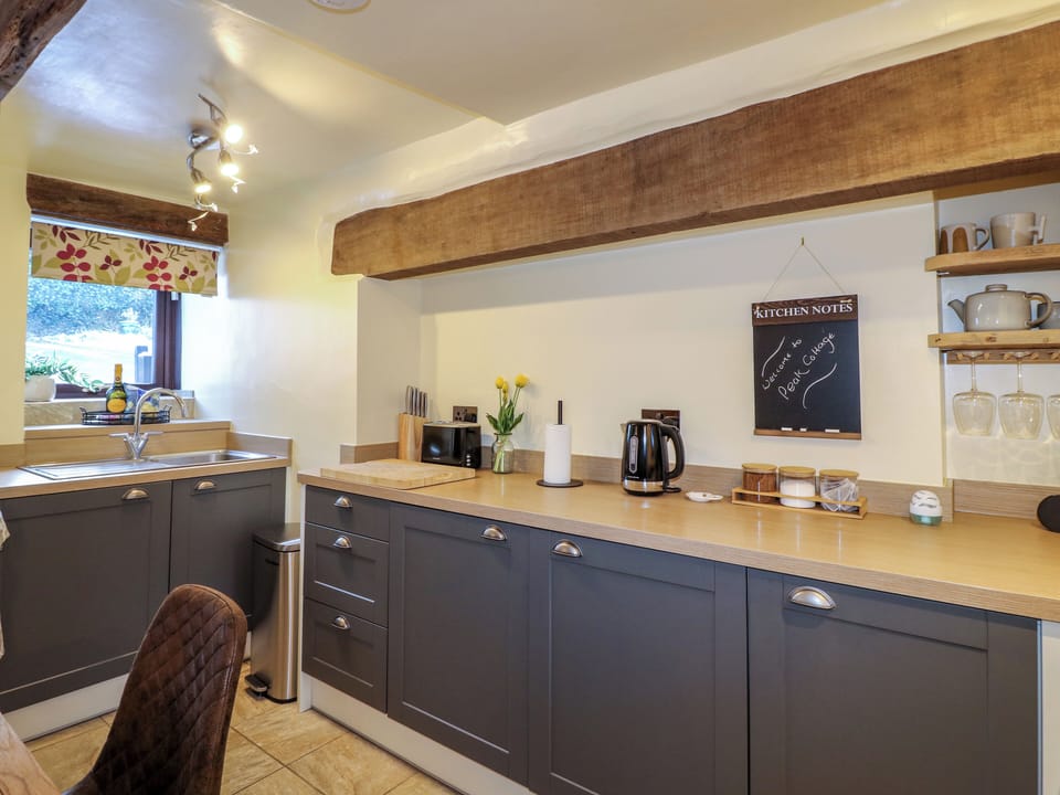 Fridge, electric kettle, toaster, cookware/dishes/utensils