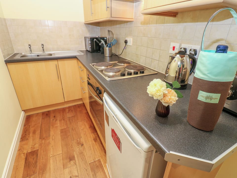 Fridge, electric kettle, toaster, cookware/dishes/utensils