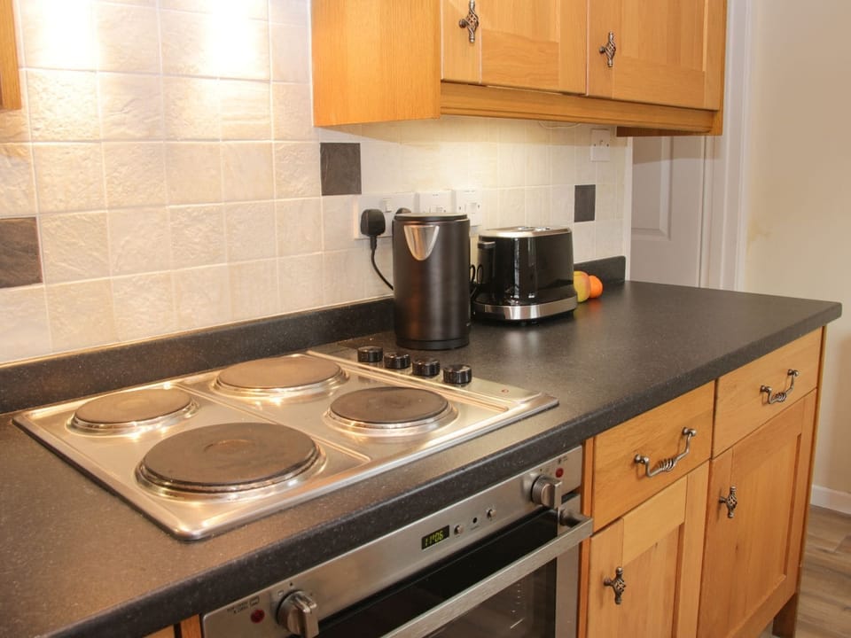 Fridge, electric kettle, toaster, cookware/dishes/utensils
