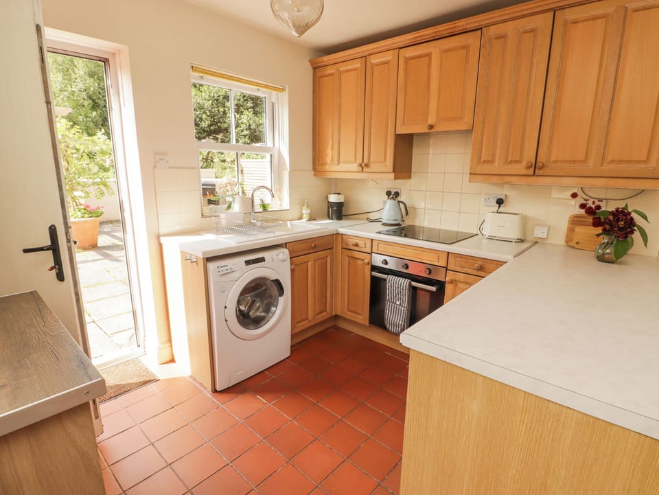 Fridge, electric kettle, toaster, cookware/dishes/utensils
